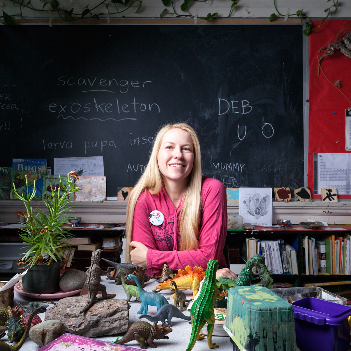 Kether Graham sits in a classroom at Alpha Alternative School