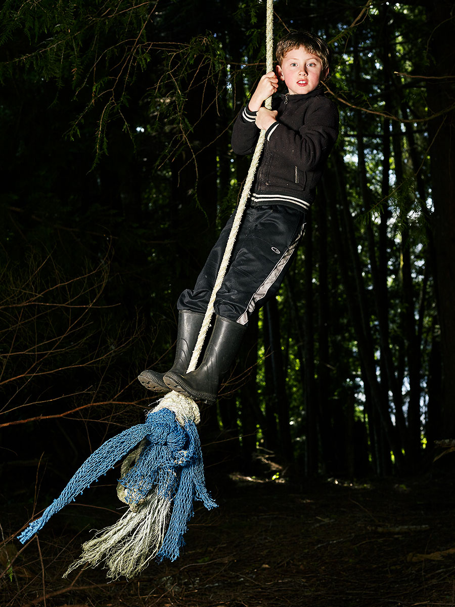 Loden was "stoked" to find this rope swing in the woods behind his house. Sointula, British Columbia.