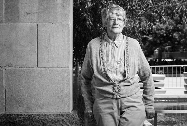 Portrait of Barbara Birkett standing in the Peace Garden at Nathan Phillips Square in Toronto.