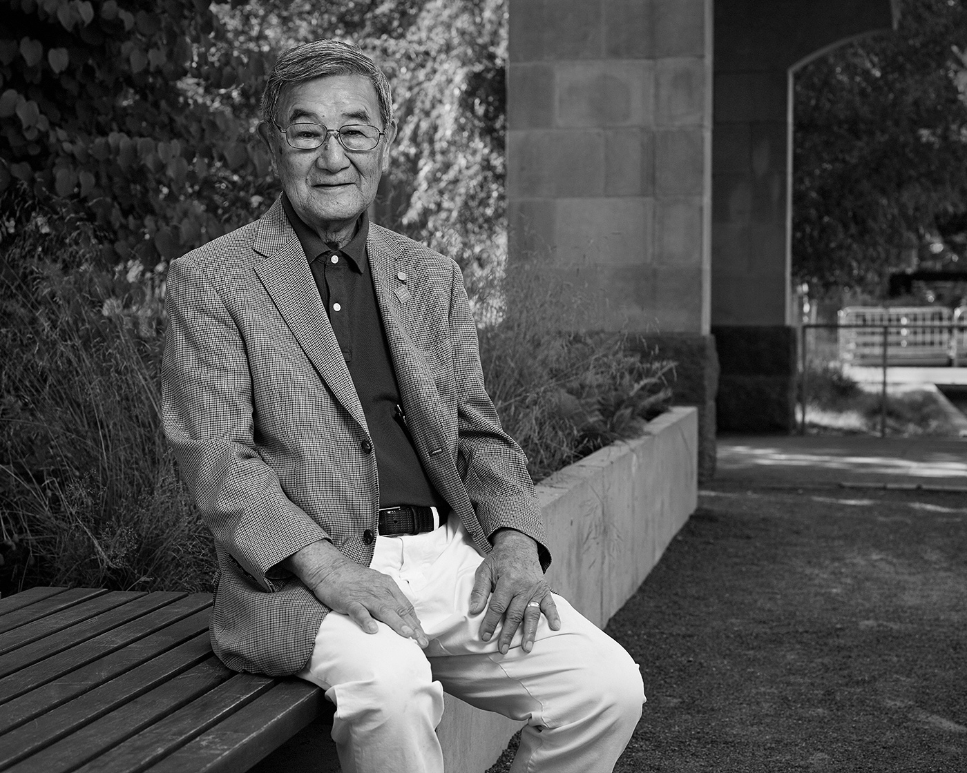 Portrait of Sid Ikeda in the Peace Garden at Nathan Phillips Square in Toronto.